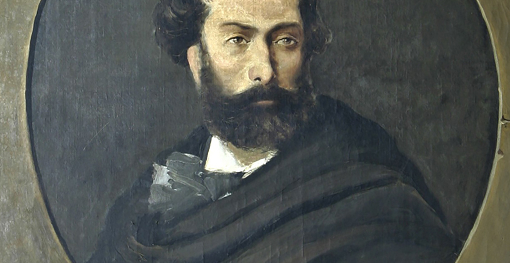 Una piedra blanca y una cruz